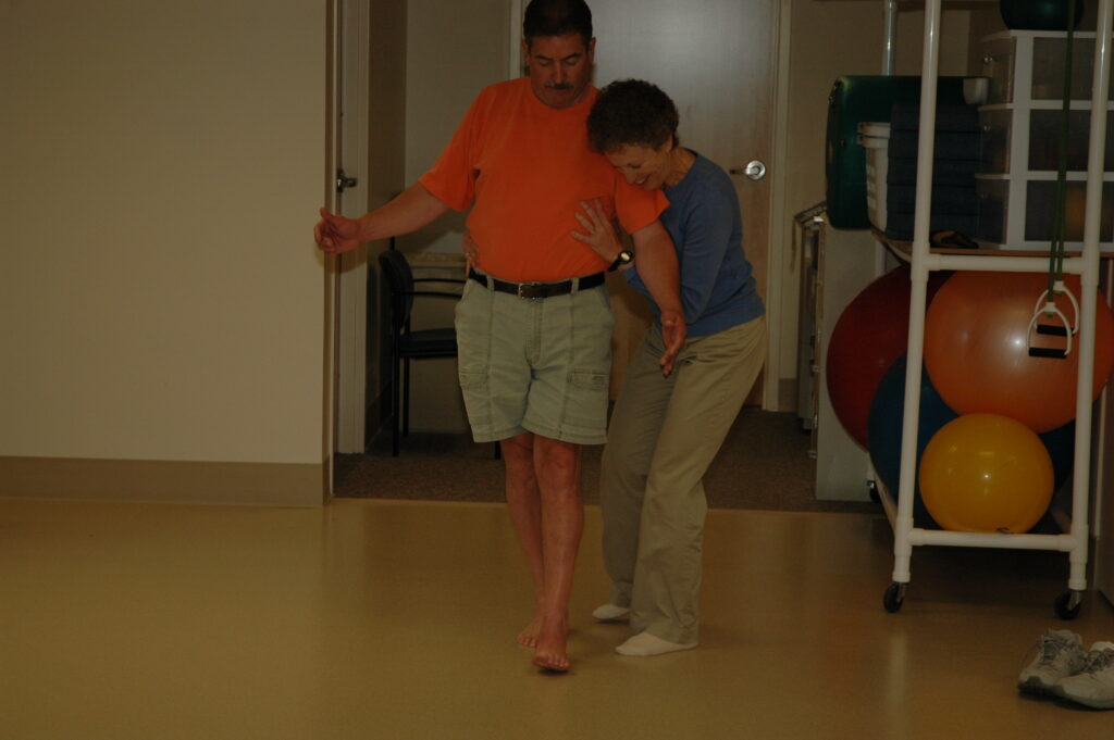 A patient able to walk wit the help of the medical professional